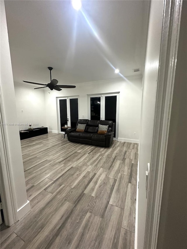 11845 SW 3rd St, Miami, FL 33184 - living room featuring a ceiling fan, wood finished floors, baseboards, and visible vents
