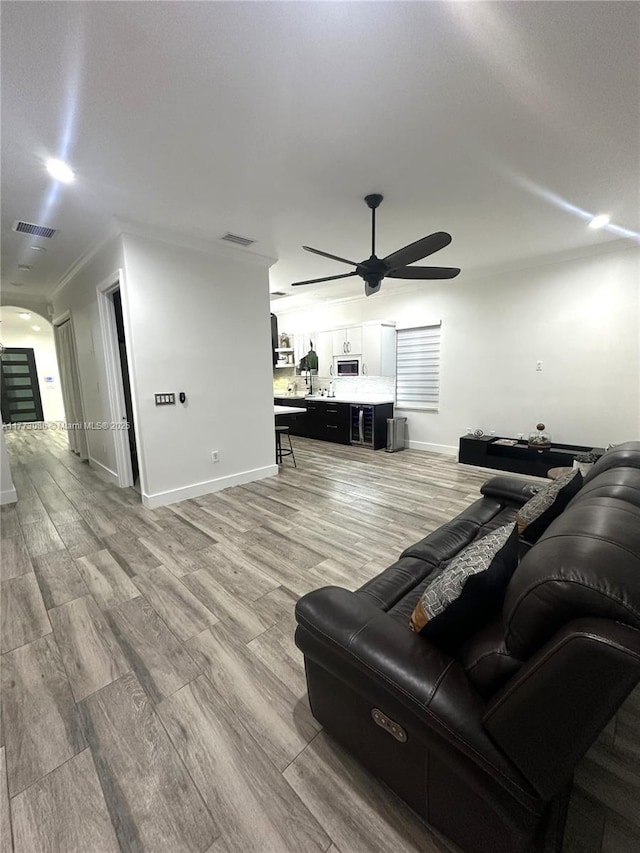 11845 SW 3rd St, Miami, FL 33184 - living room featuring light wood finished floors, baseboards, visible vents, and ceiling fan