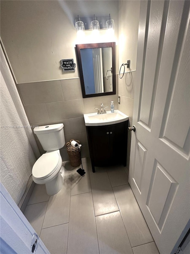 11845 SW 3rd St, Miami, FL 33184 - bathroom with tile walls, toilet, and vanity