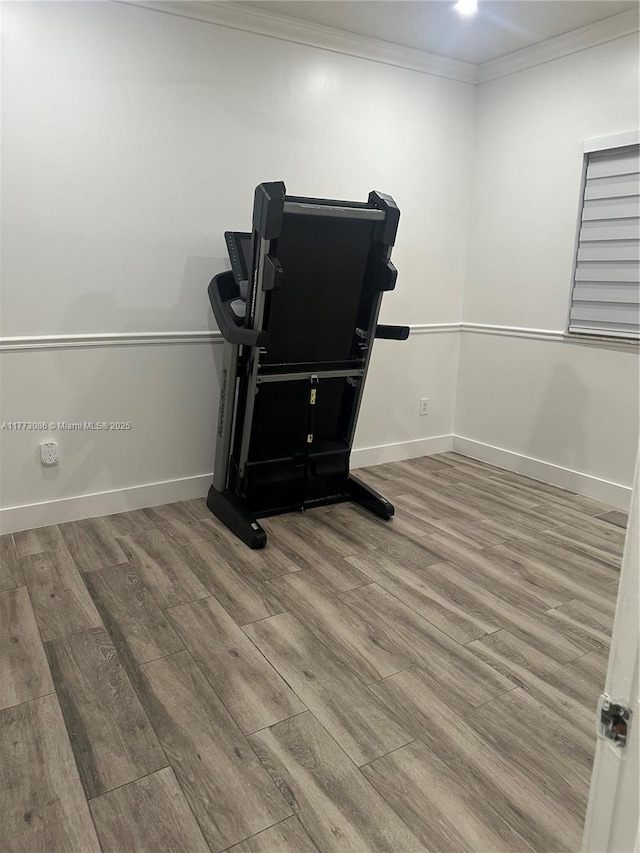11845 SW 3rd St, Miami, FL 33184 - details with crown molding, baseboards, and wood finished floors