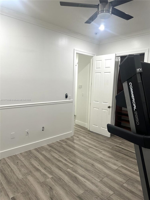 11845 SW 3rd St, Miami, FL 33184 - exercise room with wood finished floors, ornamental molding, baseboards, and ceiling fan
