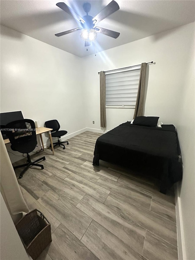 11845 SW 3rd St, Miami, FL 33184 - bedroom featuring baseboards, wood finished floors, and ceiling fan