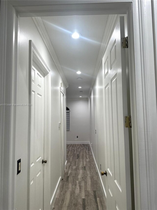 11845 SW 3rd St, Miami, FL 33184 - hall with dark wood-style flooring, ornamental molding, baseboards, and recessed lighting