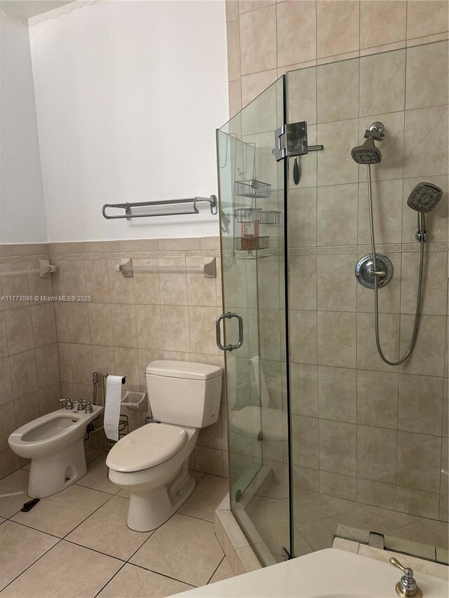 11845 SW 3rd St, Miami, FL 33184 - full bath featuring tile walls, toilet, tile patterned flooring, and a shower stall
