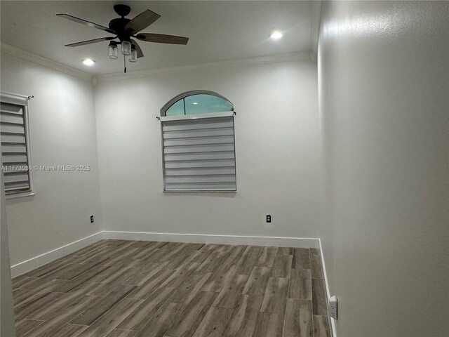 11845 SW 3rd St, Miami, FL 33184 - spare room with baseboards, wood finished floors, ornamental molding, and a ceiling fan