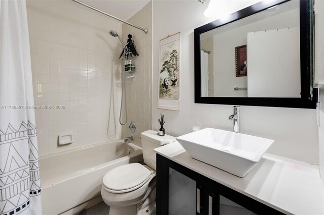 1401 NE 9th St Unit 26, Fort Lauderdale, FL 33304 - full bathroom featuring toilet, vanity, and shower / bath combo with shower curtain