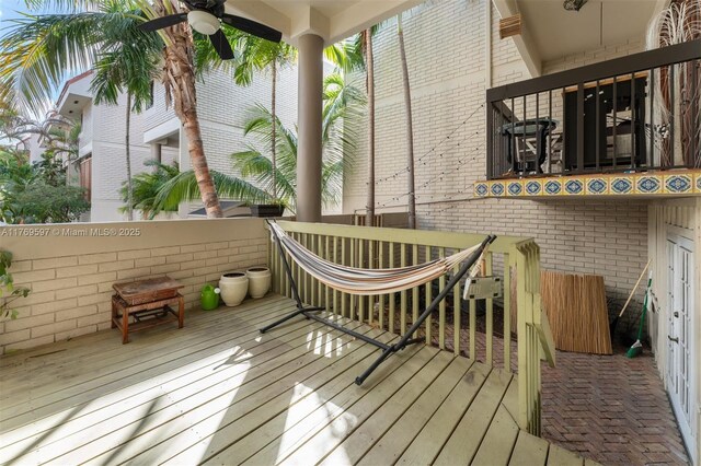 1401 NE 9th St Unit 26, Fort Lauderdale, FL 33304 - wooden deck with ceiling fan