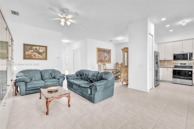 6843 Montrose Way, Boynton Beach, FL 33437 - living room with ceiling fan, light tile patterned floors, and recessed lighting