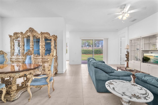 6843 Montrose Way, Boynton Beach, FL 33437 - living area with ceiling fan, light tile patterned floors, and baseboards