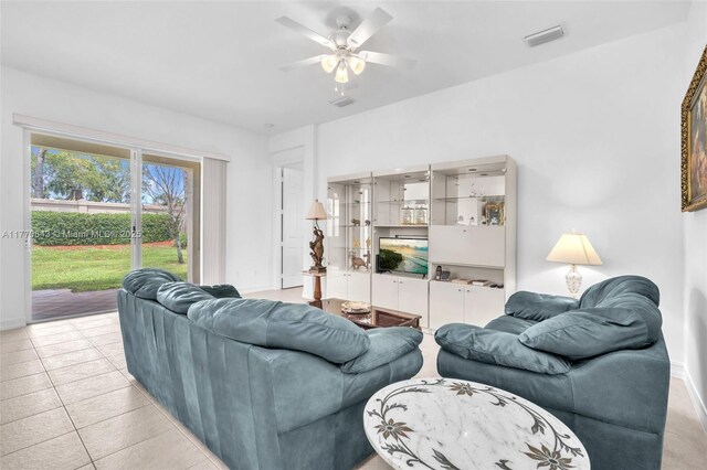6843 Montrose Way, Boynton Beach, FL 33437 - living area featuring baseboards and a ceiling fan