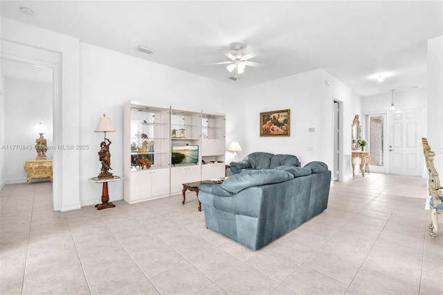 6843 Montrose Way, Boynton Beach, FL 33437 - living room with light tile patterned floors, ceiling fan, and baseboards
