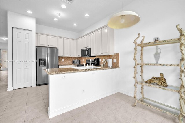 6843 Montrose Way, Boynton Beach, FL 33437 - kitchen featuring stainless steel fridge with ice dispenser, tasteful backsplash, a peninsula, white cabinets, and recessed lighting