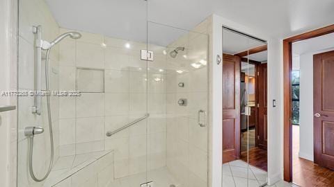 bathroom featuring a shower stall