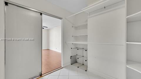 walk in closet featuring tile patterned floors