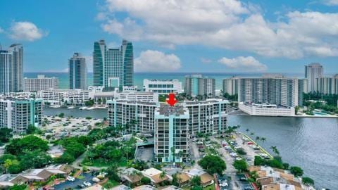 property's view of city with a water view