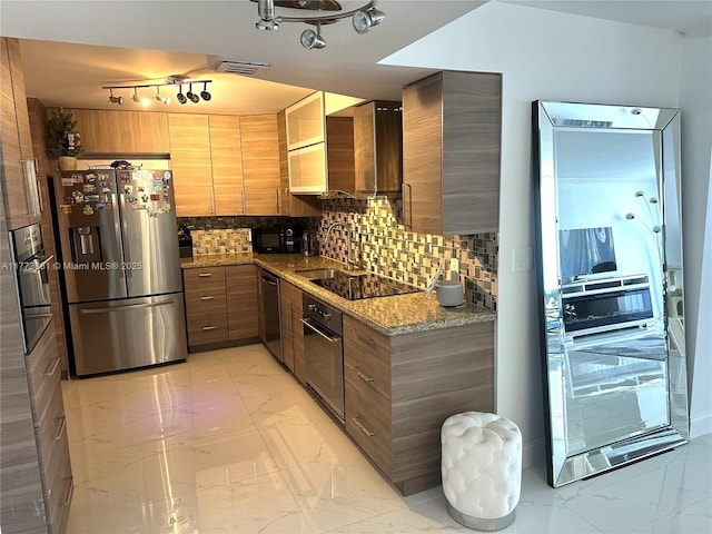427 Golden Isles Dr Unit 5G, Hallandale Beach, FL 33009 - kitchen featuring decorative backsplash, marble finish floor, modern cabinets, and black appliances