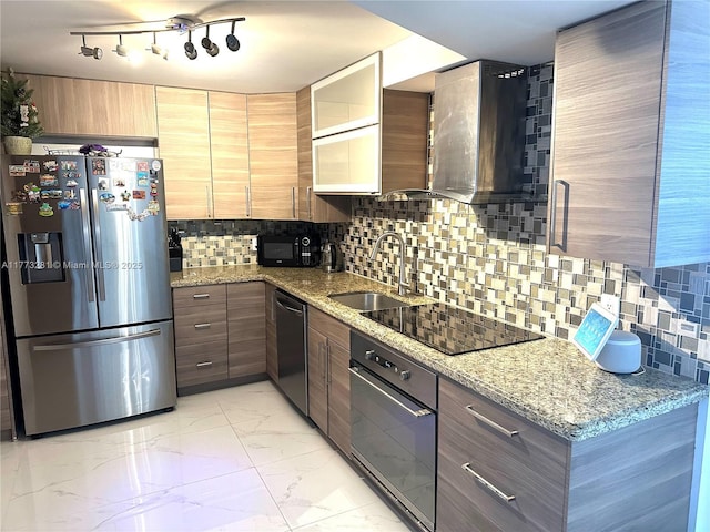 427 Golden Isles Dr Unit 5G, Hallandale Beach, FL 33009 - kitchen featuring backsplash, black appliances, wall chimney exhaust hood, marble finish floor, and a sink