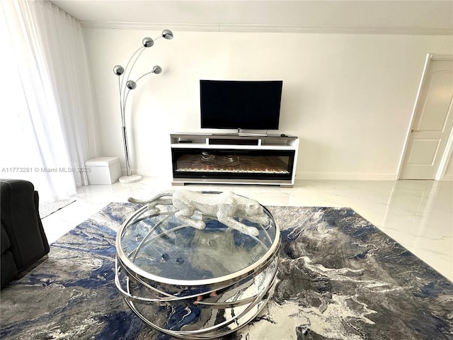 427 Golden Isles Dr Unit 5G, Hallandale Beach, FL 33009 - living room featuring marble finish floor and baseboards