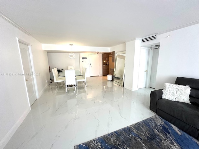 427 Golden Isles Dr Unit 5G, Hallandale Beach, FL 33009 - living area with crown molding, marble finish floor, baseboards, and visible vents