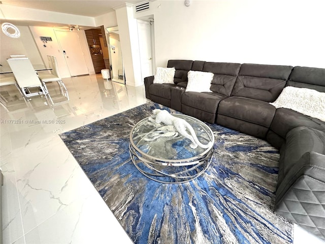 427 Golden Isles Dr Unit 5G, Hallandale Beach, FL 33009 - living area with visible vents and marble finish floor