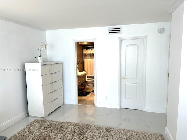 427 Golden Isles Dr Unit 5G, Hallandale Beach, FL 33009 - unfurnished bedroom with visible vents, marble finish floor, and baseboards