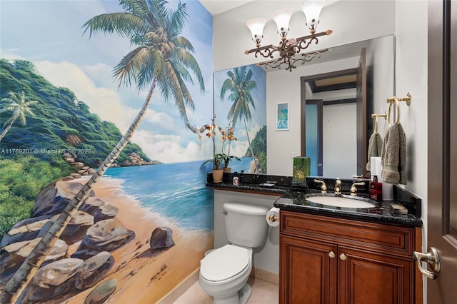 bathroom featuring toilet, a chandelier, tile patterned flooring, and vanity