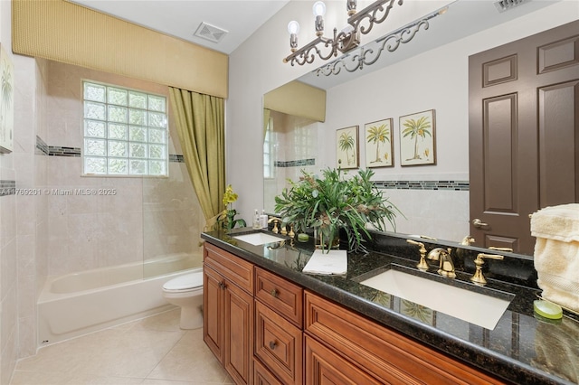 full bathroom with tile patterned floors, a sink, toilet, and visible vents