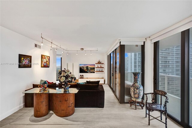 20281 E Country Club Dr Unit 1002, Aventura, FL 33180 - living area with track lighting and baseboards