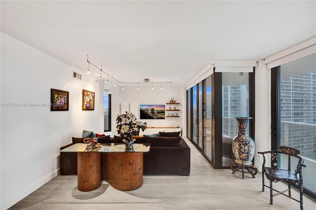 20281 E Country Club Dr Unit 1002, Aventura, FL 33180 - dining space with rail lighting and french doors