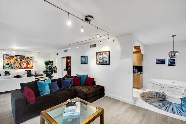 20281 E Country Club Dr Unit 1002, Aventura, FL 33180 - living room featuring track lighting and light wood-style flooring