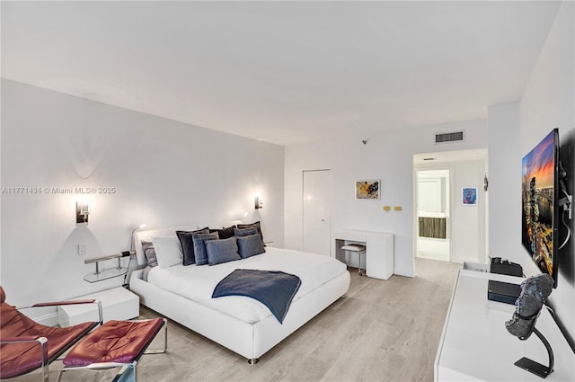 20281 E Country Club Dr Unit 1002, Aventura, FL 33180 - bedroom with light wood-type flooring