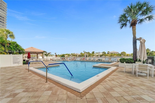 20281 E Country Club Dr Unit 1002, Aventura, FL 33180 - community pool featuring a patio area, a gazebo, and a hot tub