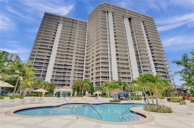 20281 E Country Club Dr Unit 1002, Aventura, FL 33180 - community pool with a patio area