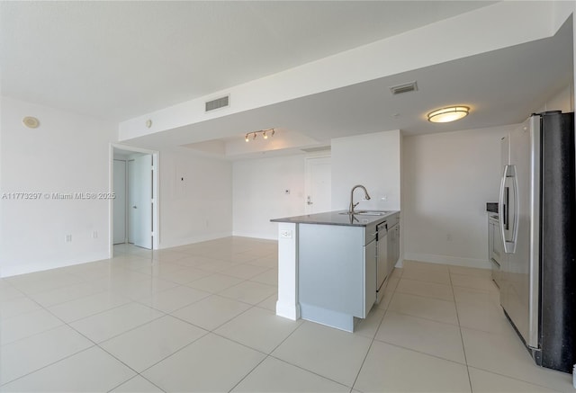 1861 NW S River Dr Unit 1904, Miami, FL 33125 - kitchen featuring freestanding refrigerator, open floor plan, a sink, and visible vents