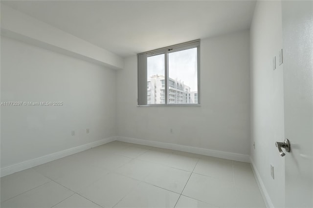 1861 NW S River Dr Unit 1904, Miami, FL 33125 - unfurnished room with light tile patterned flooring and baseboards