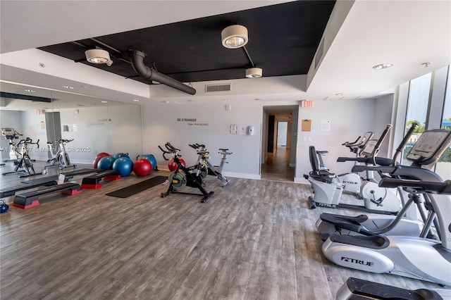 1861 NW S River Dr Unit 1904, Miami, FL 33125 - workout area with visible vents and wood finished floors