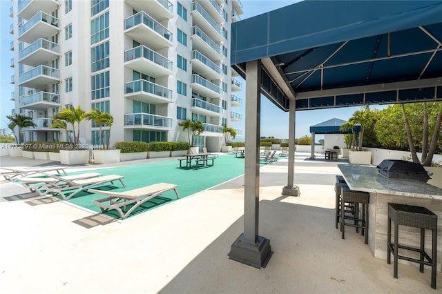 1861 NW S River Dr Unit 1904, Miami, FL 33125 - view of home's community featuring outdoor dry bar and a patio area