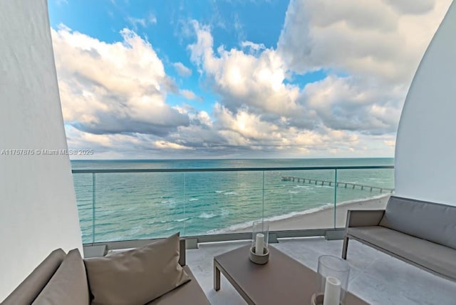 16901 Collins Ave Unit 1404, Sunny Isles Beach, FL 33160 - balcony with view of water and beach and an outdoor hangout area
