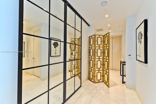 16901 Collins Ave Unit 1404, Sunny Isles Beach, FL 33160 - hall featuring marble finish flooring and recessed lighting