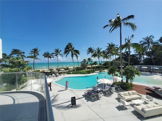 16901 Collins Ave Unit 1404, Sunny Isles Beach, FL 33160 - community pool featuring a patio area and a water view