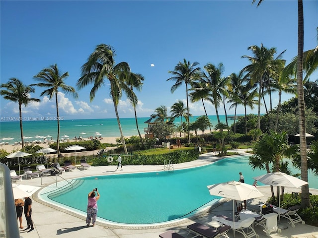 16901 Collins Ave Unit 1404, Sunny Isles Beach, FL 33160 - community pool with a water view and a patio
