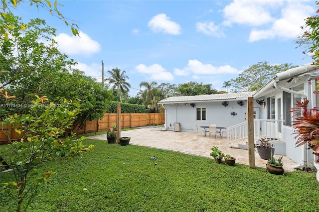 74 NE 103rd St, Miami Shores, FL 33138 - view of yard with a patio