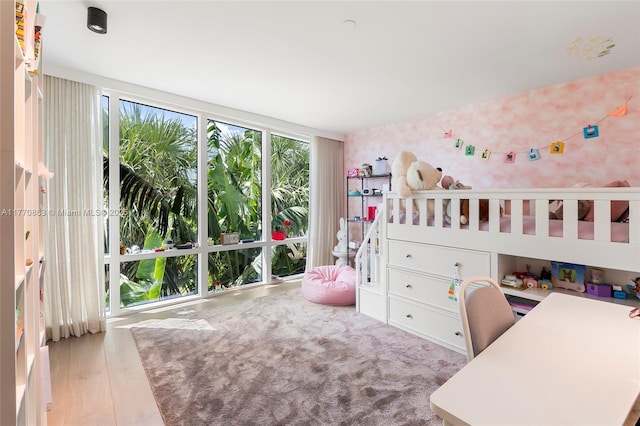bedroom with wallpapered walls