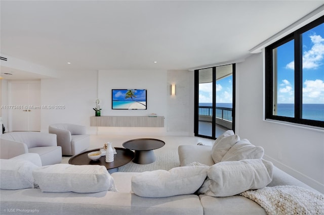 3201 S Ocean Blvd Unit 704, Highland Beach, FL 33487 - living room featuring recessed lighting