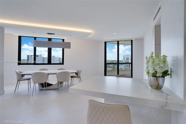 3201 S Ocean Blvd Unit 704, Highland Beach, FL 33487 - dining room featuring floor to ceiling windows