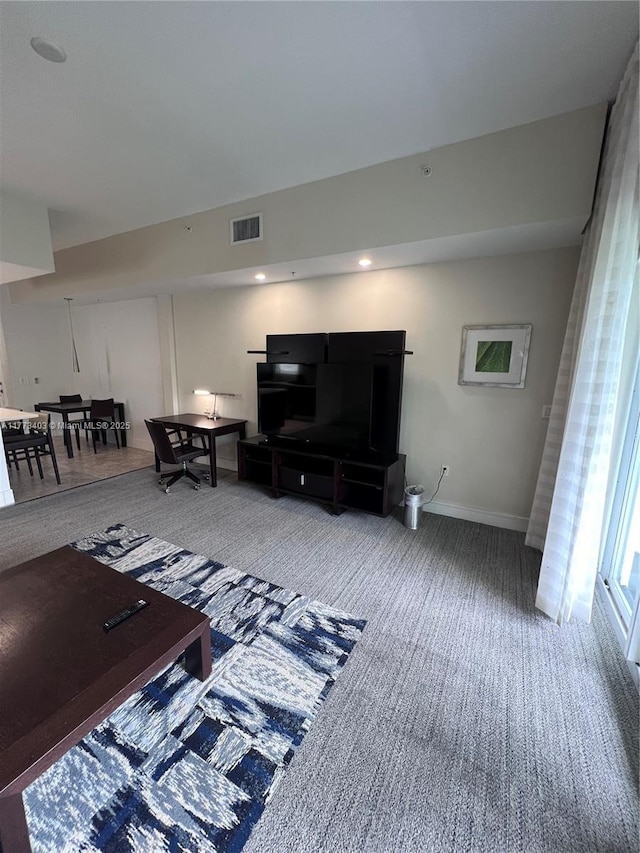 5300 NW 87th Ave Unit 916, Doral, FL 33178 - living room with baseboards, visible vents, and carpet