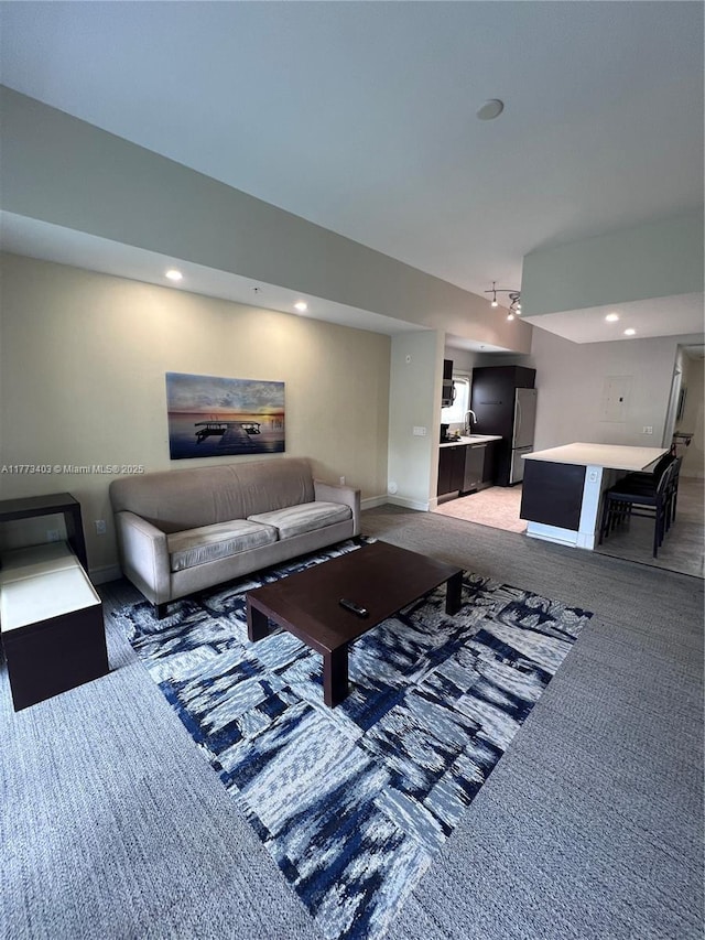 5300 NW 87th Ave Unit 916, Doral, FL 33178 - living area with light carpet, baseboards, and recessed lighting