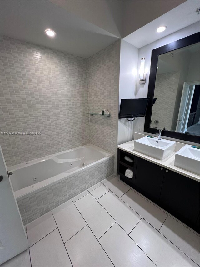 5300 NW 87th Ave Unit 916, Doral, FL 33178 - bathroom featuring double vanity, a sink, tile patterned flooring, and a whirlpool tub