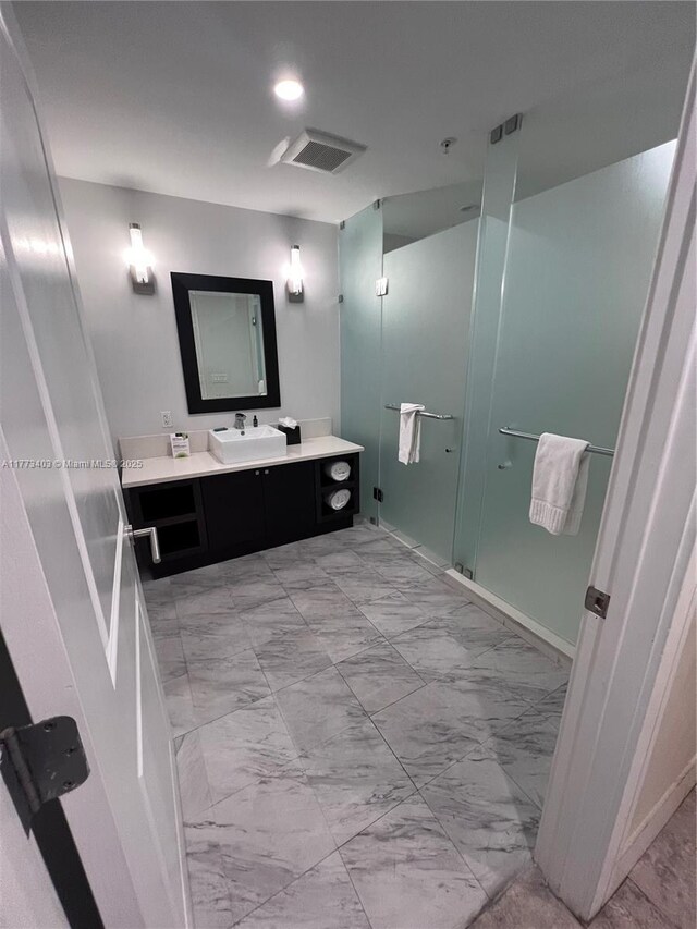 5300 NW 87th Ave Unit 916, Doral, FL 33178 - full bathroom featuring marble finish floor, vanity, visible vents, and a shower stall