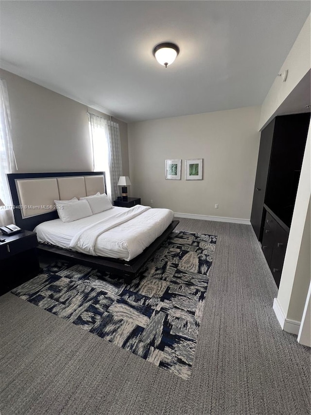 5300 NW 87th Ave Unit 916, Doral, FL 33178 - carpeted bedroom featuring baseboards